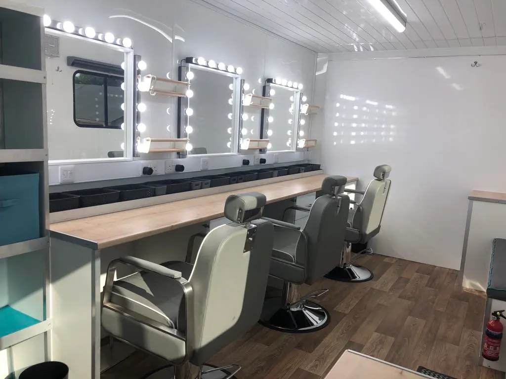 Makeup Truck interior with three stations and backwash sink